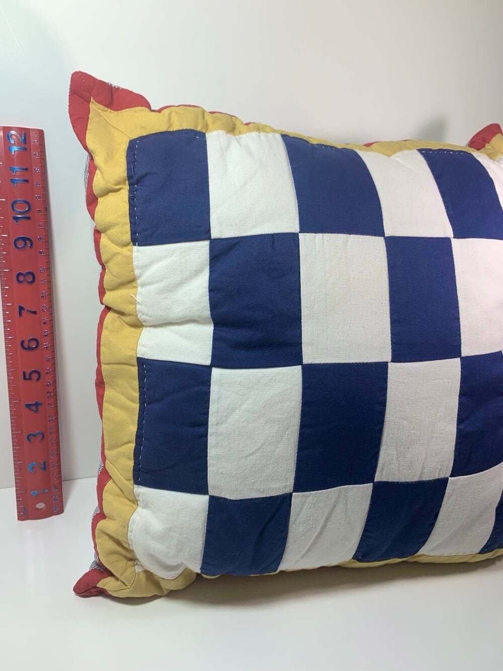 Nautica 16x16” blue,white checked throw pillow red / yellow border READ